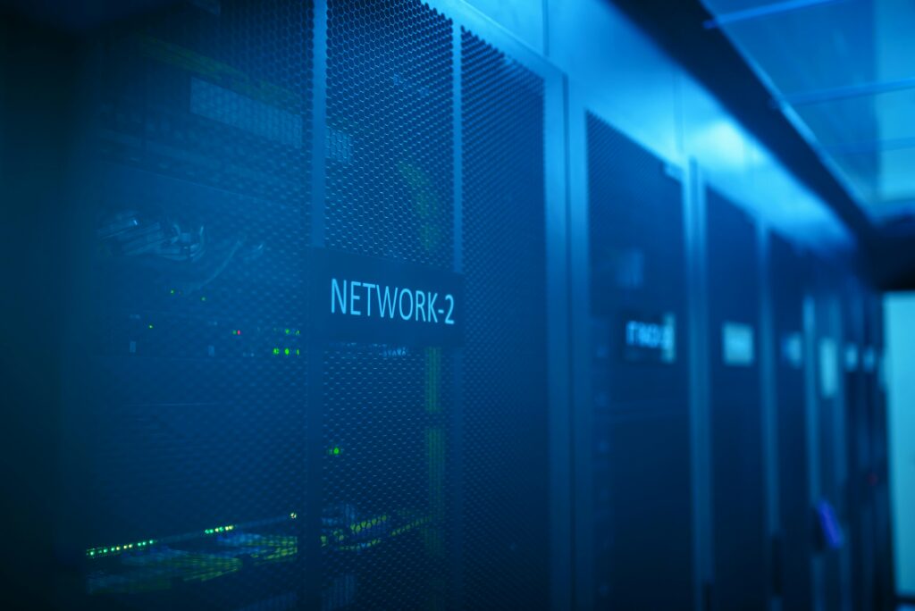 pexels photo 17323801 17323801 A modern server room featuring network equipment with blue illumination. Ideal for technology themes.